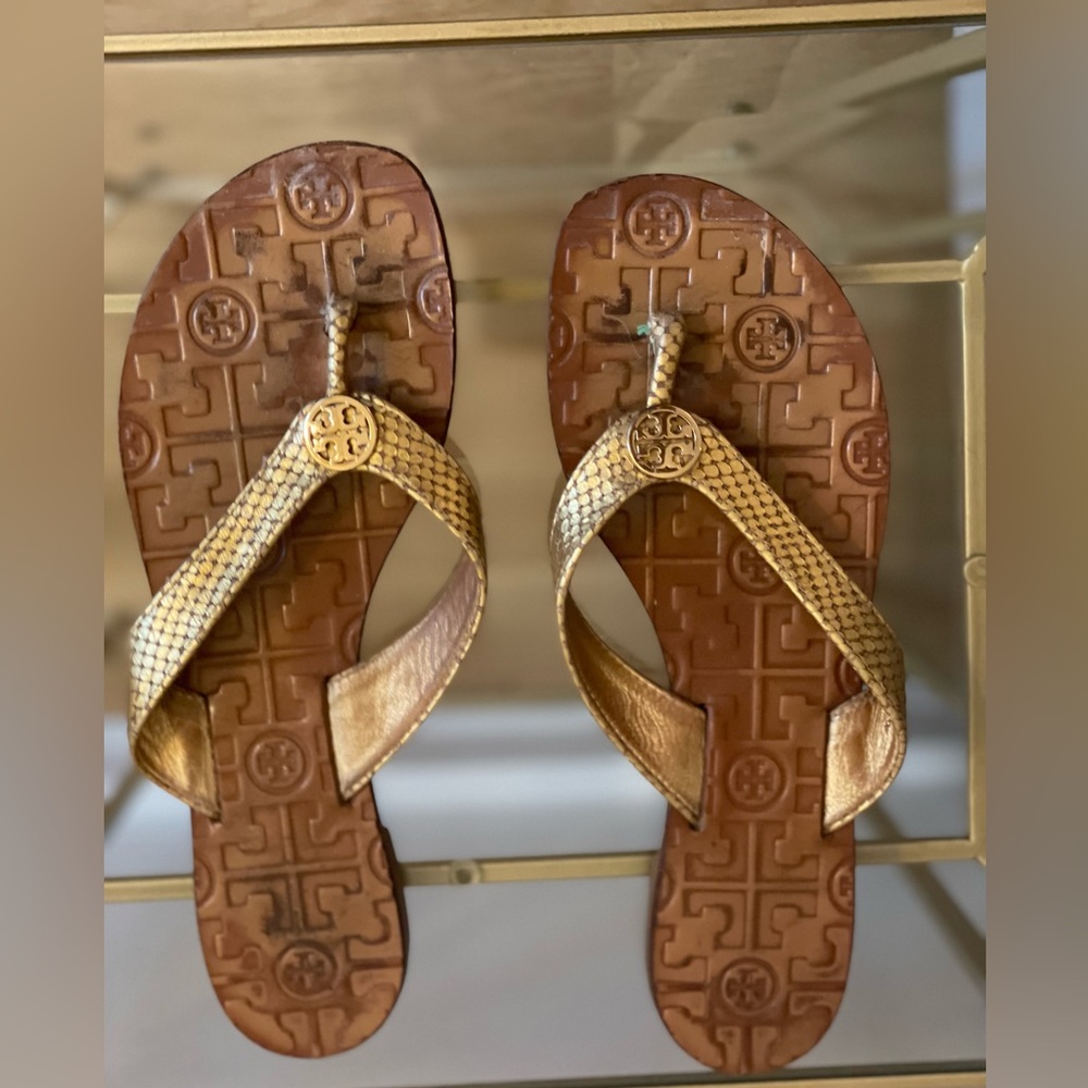 Tory Burch gold flip flops
